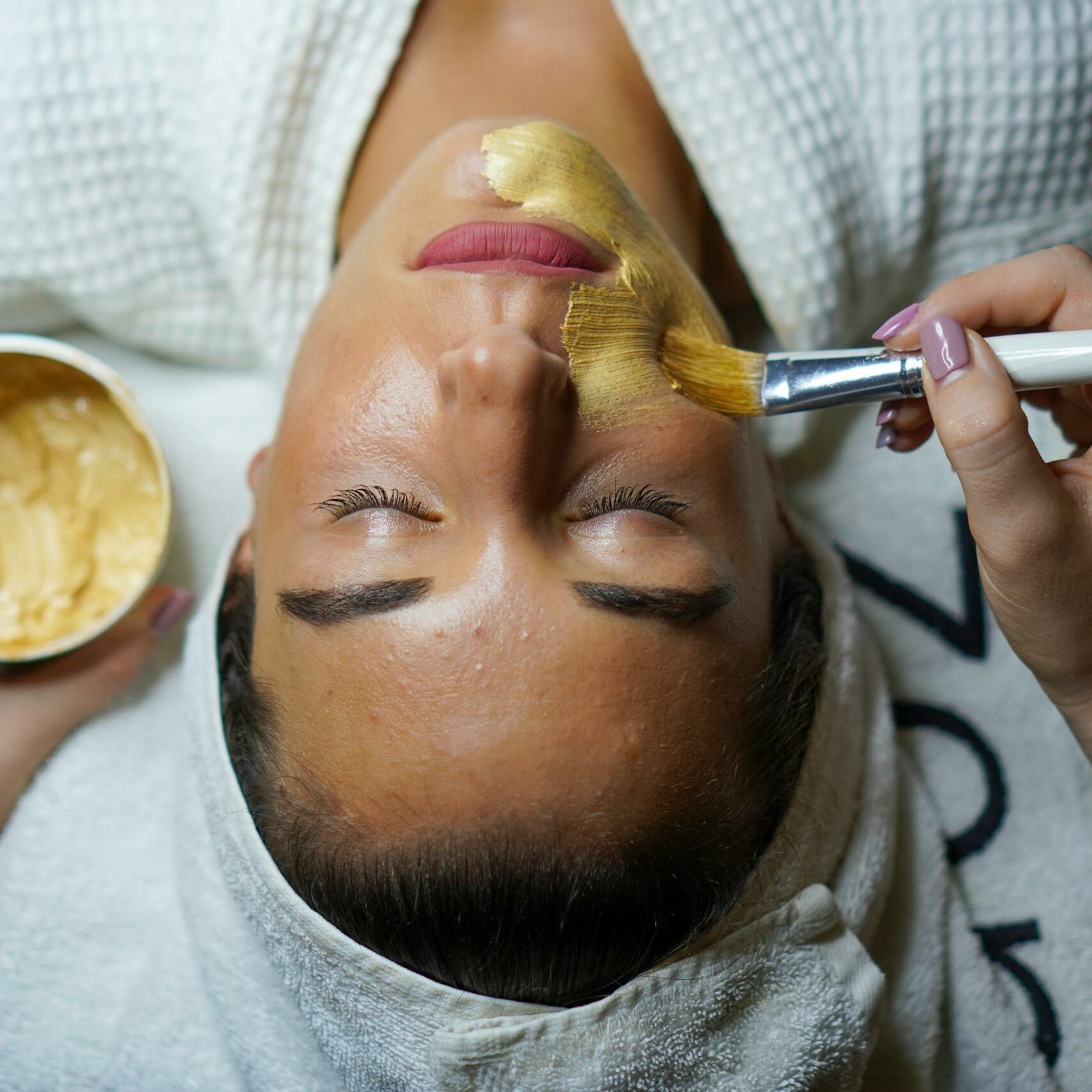 Woman Doing Facial Mask